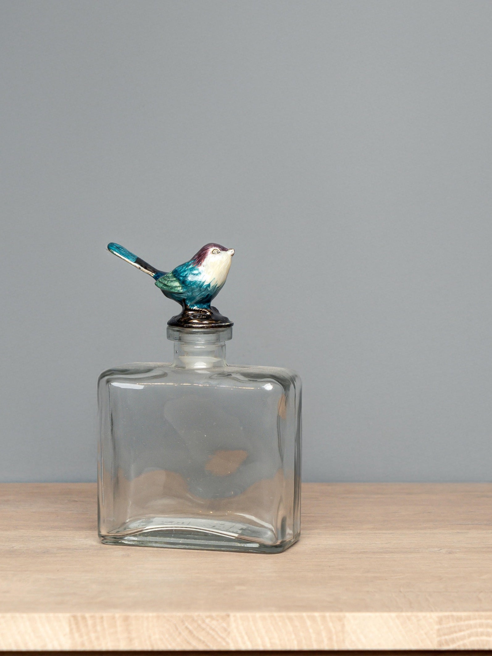Glass Bottle W/ Pewter Bird Stopper