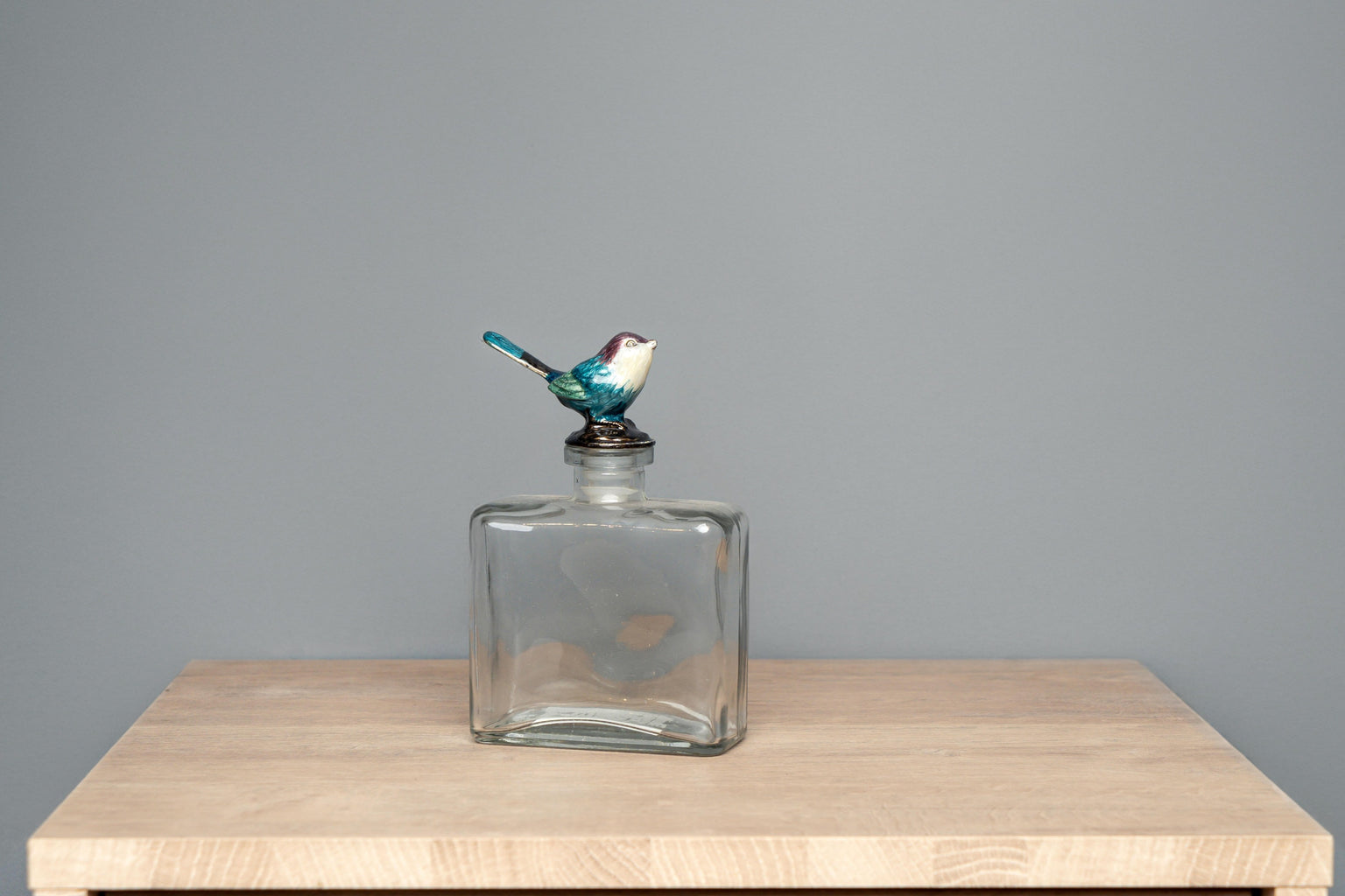 Glass Bottle W/ Pewter Bird Stopper