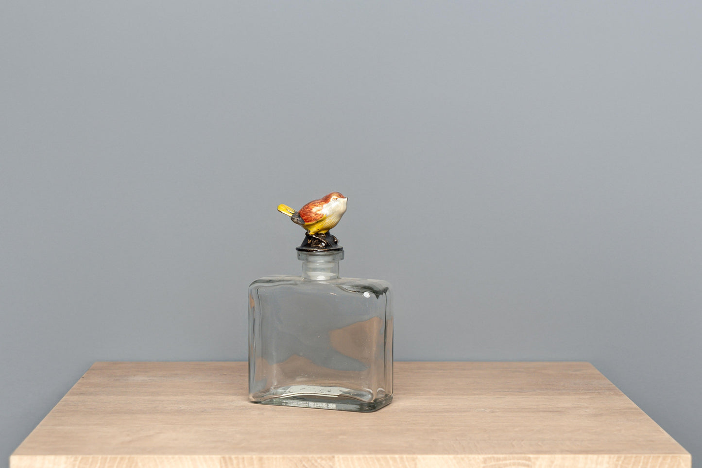 Glass Bottle W/ Pewter Bird Stopper