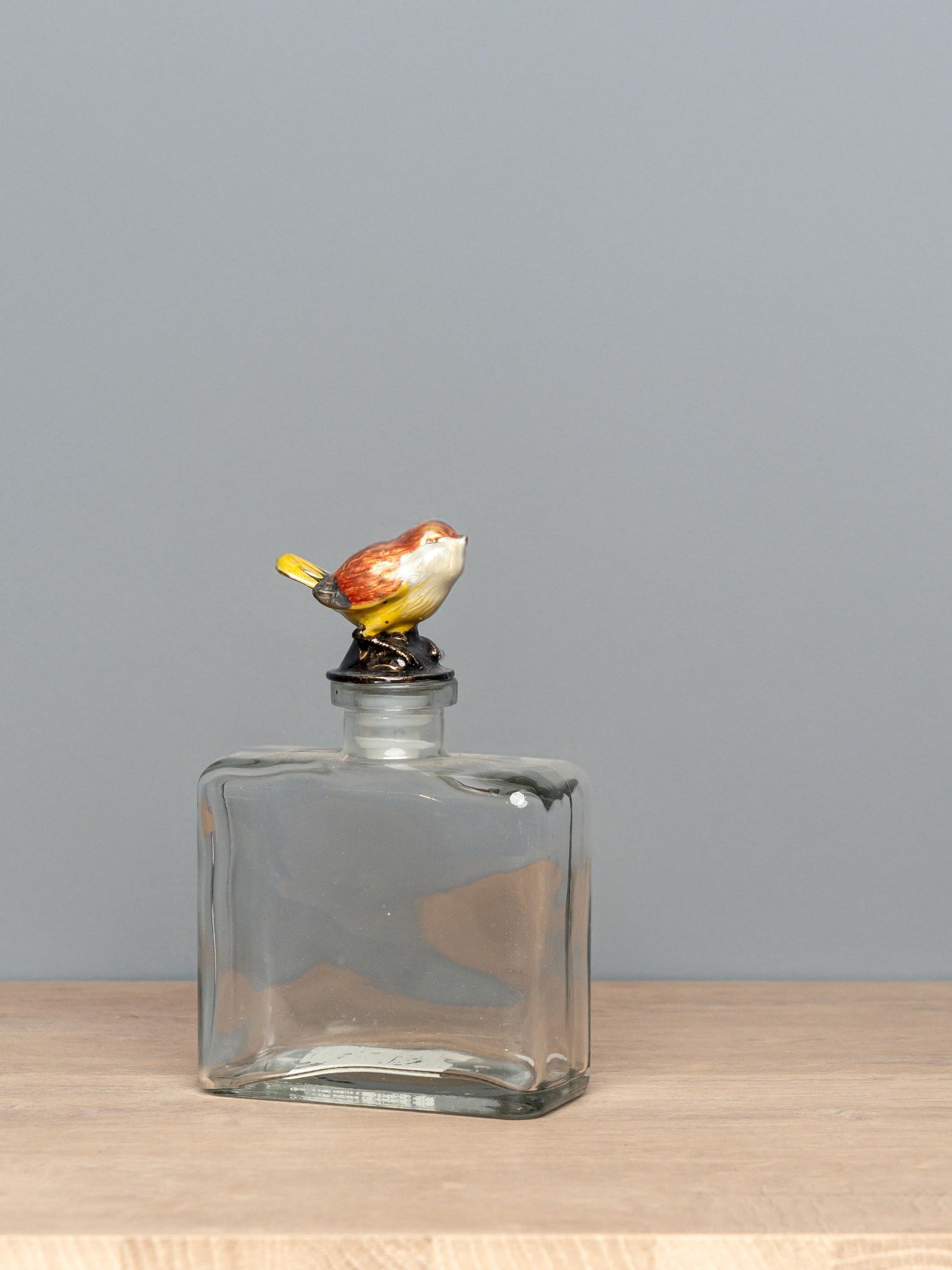 Glass Bottle W/ Pewter Bird Stopper
